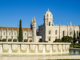 Fototapeta premium Jeronimos Monastery in Lisbon - the most grandiose monument to late-Manueline Portuguese style architecture, and Church of Santa Maria of Belem in Lisbon, Portugal