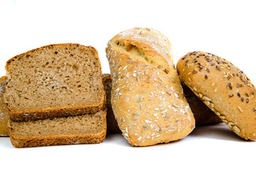 Various breads isolated on a white background. The concept of baking bread, eating meals with rolls, bread. Product made of wheat and rye flour, bread preparation.