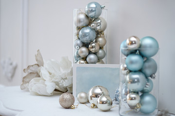 New Year's toys stand on the fireplace as decorations. Beautiful christmas background