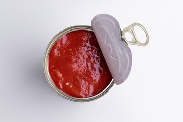 Tin of chopped canned tomatoes, isolated on white background, soft light