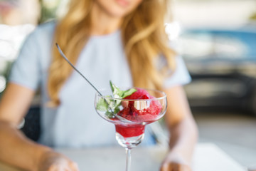 Fruit strawberry sorbet with mint in a bowl 