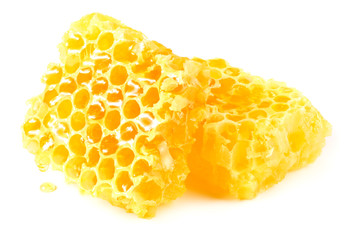 Honeycomb with honey isolated on white background