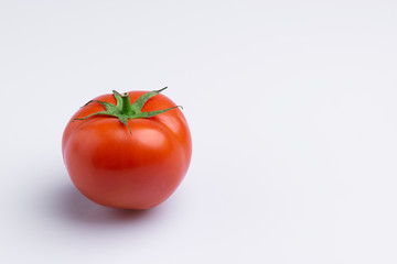 Tomato isolated on white background, soft light,