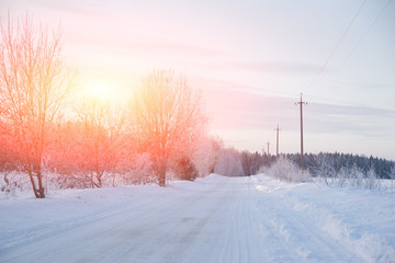 Snowy winter road. Winter fairy tale. Ride on a winter road.