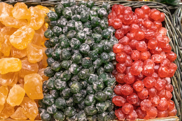 Candied fruits in famous market Boqueria in Barcelona of Spain