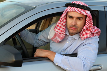 Arabic man driving a car 