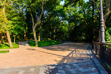 Footpath in city park on summer day