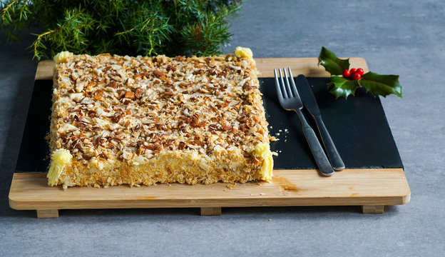 Hojaldres de Torrelavega, Cantabria, Spain. with buttercream, decorated with almonds. polkas, typical Puff pastry, pastry made from a laminated dough, christmas time