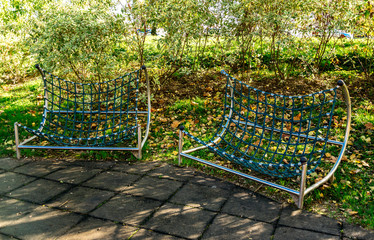 Hammock type seats on a children playground in Bindek city park, Zagreb, Croatia