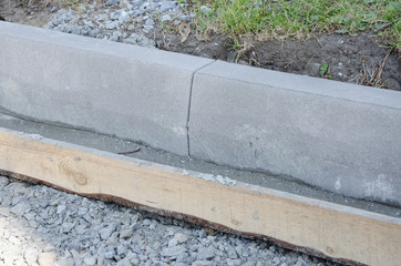 Road repair. Installation of road borders.