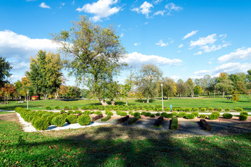 A footpath along landscaped garden area in Bundek city park, Zagreb, Croatia