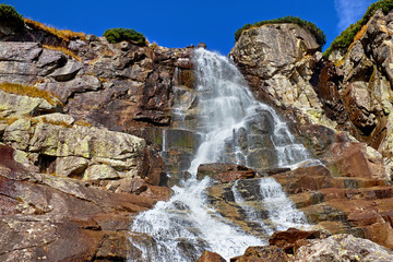 Skok waterfall near to Strbske pleso lake in High Tatras National Park, Slovakia © andras_csontos