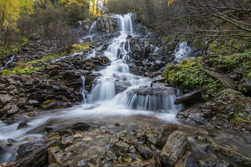 beautiful waterfall in the alps