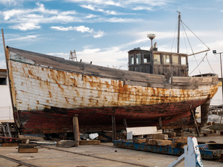  old and rusty ship under repair