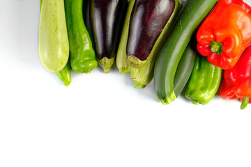 zucchinis , peppers red and green, and eggplants isolated