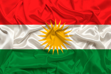 beautiful photo of the colored national flag of the modern state of Kurdistan on textured fabric,...