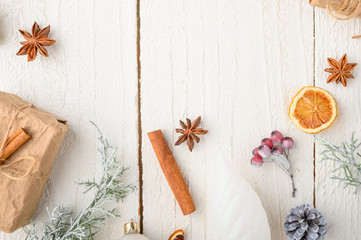Christmas composition or Christmas on a white wooden background.Gifts and Christmas tree branches.