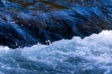 wave in the blue water