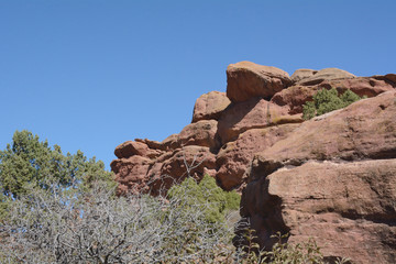 Autumn landscape of prehistoric sandstone rock formations at Red Rocks Park in Morrison Colorado