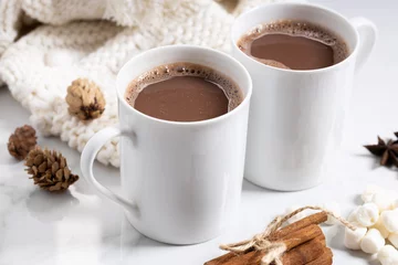 Foto op Plexiglas White ceramic cups of hot cocoa on top of white marble background © janecocoa