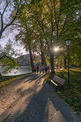 Make a walk. An inviting road with people on it.