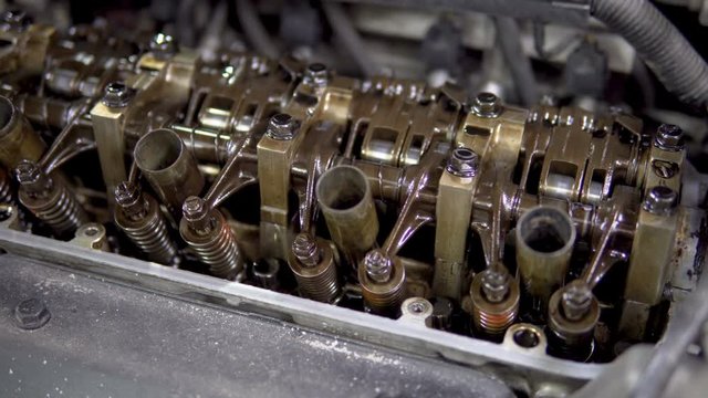 Repair car engine at mechanic service