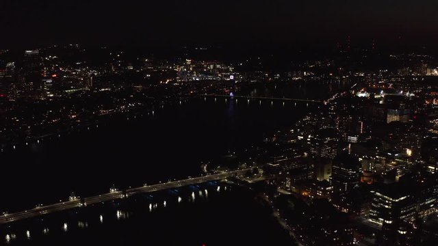 Aerial of Boston at night, cityscape on sunset, the capital of Massachusetts, travel around US, a river through a city