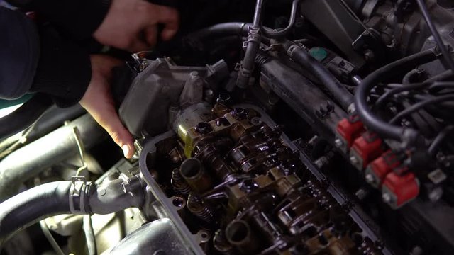 Engine valve car maintenance.The cylinder block of the four-cylinder engine. Disassembled motor vehicle for repair
