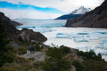 Hikers Looking at Glacier Grey In  Chile Torres del Paine National Park, Patagonia 