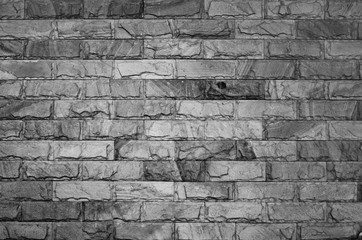 Sandstone wall at night. Black and White background. Dark tone.