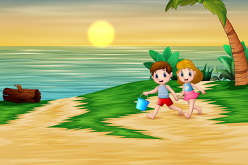 Obraz na płótnie Canvas Happy children playing on the sea side