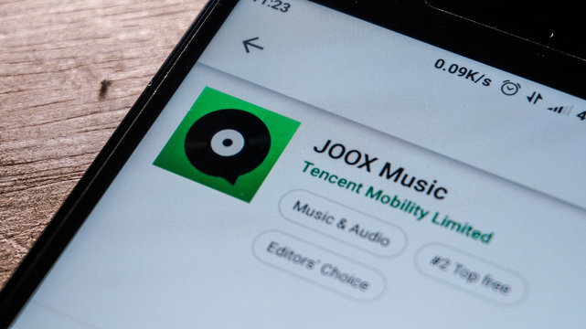 Magelang, Central Java, Indonesia, April 16, 2019. JOOX Music app in play store. close up on the Android Smartphones screen. - Image