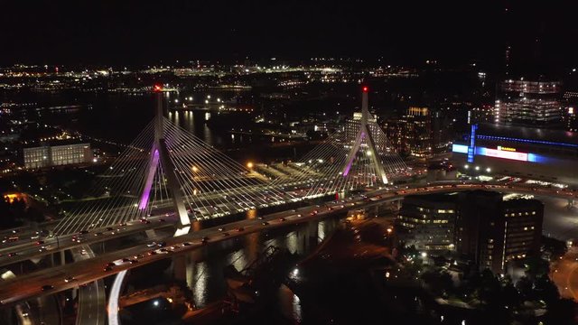 View of night Leonard P. Zakim Bunker Hill Memorial Bridge, aerial of night Boston, industrial northeast of USA, night city life