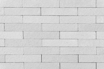 White and light gray brick wall texture for background or wallpaper.