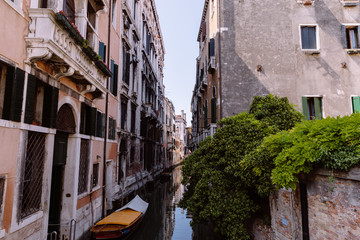 Obraz na płótnie Canvas Panoramic view of Venice narrow canal with historical buildings and boat