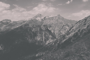 Panorama of mountains scene with dramatic blue sky in national park of Dombay