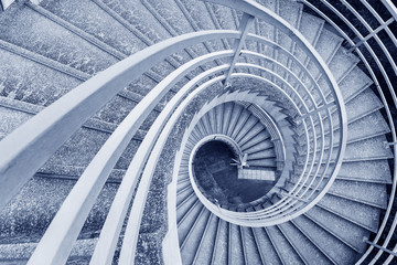 Empty modern spiral stairway, viewed from top