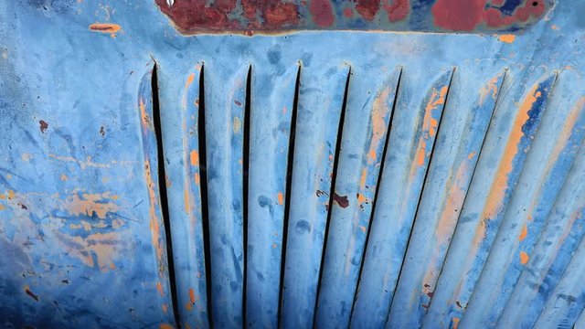 Powder Blue Rusted Metal Vents on Side of Truck - Slow Motion.