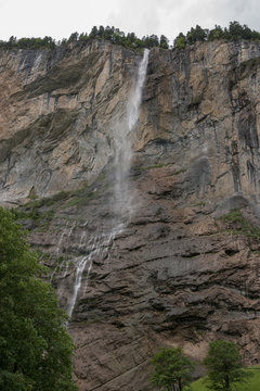 View closeup waterfall Staubbach fall in mountains, valley of waterfalls © TravelFlow