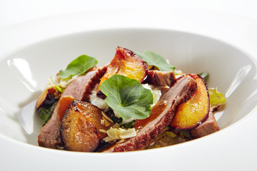 Salad with Roasted Duck Breast, Baked Pear and Strachatella