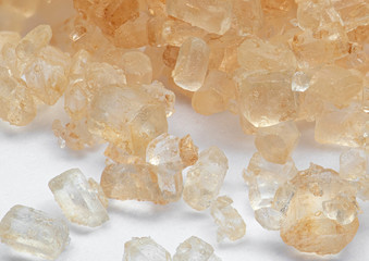 Macro Photo of Pile of Brown Sugar on White Floor