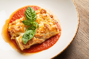 tasty lasagna with tomato sauce