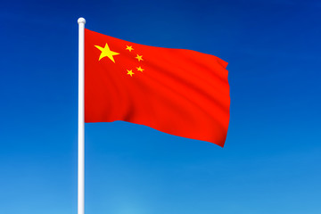 Waving flag of China on the blue sky background