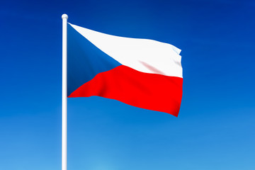 Waving flag of Czech Republic on the blue sky background