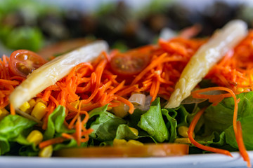Colortful vegan salad with carrot and asparagus