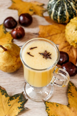 Chestnut of pear autumn drink. Cafe menu, still life. Vertical photo.
