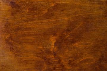 Polished wood surface. The background of polished wood texture.
