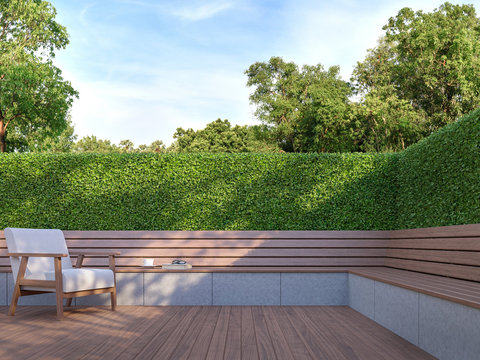 Wooden bench in the garden 3d render,  There is a wooden floor terrace,green bush fence,decorate with wood and white fabric furniture.