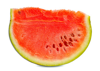 Isolated watermelon with cut watermelon slice with red flesh on white background