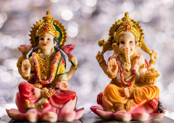 Religion concept with Hindu goddess Lakshmi and God ganesha
